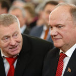 
              FILE Russia's nationalist Liberal Democratic Party leader Vladimir Zhirinovsky, left, speaks to Russian Communist leader Gennady Zyuganov while they prepare to listen to Russian President Dmitry Medvedev's last state-of-the nation address in Moscow's Kremlin, Russia, Thursday, Dec. 22, 2011. On Wednesday, April 6, 2022 State Duma speaker Vyacheslav Volodin said that Zhirinovsky, who has been the head of Russia's nationalist Liberal Democratic Party for three decades, died at the age of 75. (AP Photo/Alexander Zemlianichenko, pool, File)
            