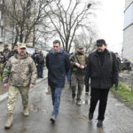 
              In this photo provided by the Spanish government, Spain's Prime Minister Pedro Sanchez, center, visits the city of Borodyanka, Ukraine, Thursday, April 21, 2022. Spain's Prime Minister Pedro Sanchez said he was "shocked to witness the horror and atrocities of Putin's war on the streets of Borodyanka," a town in northern Ukraine that has been devasted by the invasion. (Spanish Government via AP)
            