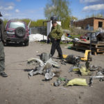 
              Police officers inspect fragments of a Russian missile after Thursday shelling in Fastov, south of Kyiv, Ukraine, Friday, April 29, 2022. (AP Photo/Efrem Lukatsky)
            