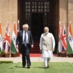 
              British Prime Minister Boris Johnson, left, meets Indian Prime Minister Narendra Modi at Hyderabad House in New Delhi Friday, April 22, 2022. (Stefan Rousseau/Pool Photo via AP)
            