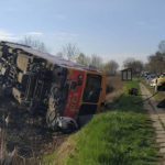 
              A derailed train carriage lies on its side after a fatal collision with a van in Mindszent, Hungary on Tuesday, April 5, 2022. Police say a train has struck a vehicle in southern Hungary and derailed, leaving several people dead and others injured. The accident occurred just before 7 a.m. in the town of Mindszent. (Csongrad-Csanad County Police via AP)
            