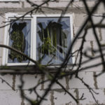 
              A destroyed window of a house is seen during a military sweep to search for possible remnants of Russian troops after their withdrawal from villages in the outskirts of Kyiv, Ukraine, Friday, April 1, 2022. (AP Photo/Rodrigo Abd)
            