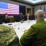 
              In this photo provided by the Ukrainian Presidential Press Office on Monday, April 25, 2022, U.S. Secretary of Defense Lloyd Austin, center, Secretary of State Antony Blinken, centre right, and Ukrainian President Volodymyr Zelenskyy, second from right, attend their meeting, Sunday, April 24, 2022, in Kyiv, Ukraine. (Ukrainian Presidential Press Office via AP)
            