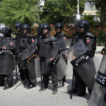 
              Security personnel from the Frontier Constabulary stand guard during a protest in Islamabad, Pakistan, Sunday, April 3, 2022. Pakistan's embattled Prime Minister Imran Khan said Sunday he will seek early elections after sidestepping a no-confidence challenge and alleging that a conspiracy to topple his government had failed. (AP Photo/Rahmat Gul)
            