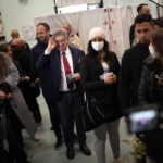 
              French far-left candidate Jean-Luc Melenchon salutes as he arrives to vote for the first round of the presidential election at a polling station Sunday, April 10, 2022 in Marseille, southern France. Polls opened across France for the first round of the country's presidential election, where up to 48 million eligible voters will be choosing between 12 candidates. (AP Photo/Daniel Cole)
            