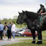 
              Officers on horseback guard the entrance to designated demonstrator areas near Riverbend Maximum Security Institution as people wait to enter before the scheduled execution of inmate Oscar Smith, Thursday, April 21, 2022, in Nashville, Tenn. Tennessee Gov. Bill Lee issued a statement Thursday saying he was granting a temporary reprieve to Smith, a 72-year-old inmate. (AP Photo/Mark Humphrey)
            