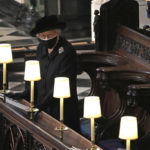 
              FILE - Britain's Queen Elizabeth II in St. George's Chapel during the funeral of Prince Philip, the man who had been by her side for 73 years, at Windsor Castle, Windsor, England, Saturday April 17, 2021. Queen Elizabeth II is marking her 96th birthday privately on Thursday, April 21, 2022 retreating to the Sandringham estate in eastern England that has offered the monarch and her late husband, Prince Philip, a refuge from the affairs of state. (Yui Mok/Pool via AP, File)
            