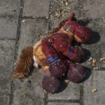 
              A stuffed horse with bloodstains on it lies on a platform after Russian shelling at the railway station in Kramatorsk, Ukraine, Friday, April 8, 2022. Hours after warning that Ukraine's forces already had found worse scenes of brutality in a settlement north of Kyiv, President Volodymyr Zelenskyy said that “thousands” of people were at the station in Kramatorsk, a city in the eastern Donetsk region, when it was hit by a missile. (AP Photo/Andriy Andriyenko)
            