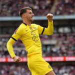 
              Chelsea's Mason Mount celebrates after scoring his side's second goal during the English FA Cup semifinal soccer match between Chelsea and Crystal Palace at Wembley stadium in London, Sunday, April 17, 2022. (AP Photo/Kirsty Wigglesworth)
            