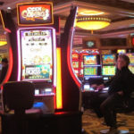 
              This Jan. 27, 2022, photo shows a gambler playing a slot machine at Caesars casino in Atlantic City, N.J. Figures released on April 5, by the American Gaming Association show the U.S. casino industry is off to its best two-month start in history this year, having won nearly $9 billion from gamblers in January and February. (AP Photo/Wayne Parry)
            