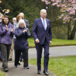 
              President Joe Biden arrives with Sen. Patty Murray, D-Wash., and Sen. Maria Cantwell, D-Wash., to speak at Seward Park on Earth Day, Friday, April 22, 2022, in Seattle. (AP Photo/Andrew Harnik)
            