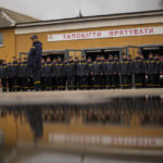 
              Members of the 11th State Fire and Rescue Unit stand during a ceremony commemorating the Chernobyl nuclear power plant disaster, in Chernobyl, Ukraine, Tuesday, April 26, 2022. (AP Photo/Francisco Seco)
            