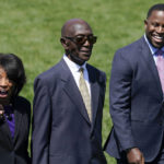 
              Judge Ketanji Brown Jackson's mother Ellery Brown, left, father Johnny Brown, center, and brother Ketajh Brown arrive on the South Lawn of the White House where President Joe Biden, accompanied by Vice President Kamala Harris and Judge Jackson, will speak and celebrate the confirmation of Judge Jackson as the first Black woman to reach the Supreme Court, Friday, April 8, 2022 in Washington. (AP Photo/Andrew Harnik)
            