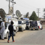 
              Digital Satellite News Gathering vans from local news channels are parked near the Kot Lakhpat prison, where the trial of people involved in the killing of Priyantha Kumara, a Sri Lankan factory manager, is being held, on the outskirts of Lahore, Pakistan, Monday, April 18, 2022. A defense lawyer said a court in Pakistan’s eastern city of Lahore has sentenced six people to death and handed down life imprisonment to nine others after finding them guilty of involvement in last year’s vigilante killing of Kumara whose body was publicly burned over an allegation of blasphemy. As many as 73 suspects were also awarded jail terms from two to five years each on Monday by the court. (AP Photo/K.M. Chaudary)
            