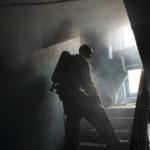 
              A firefighter pauses to cool down while extinguishing a fire in an apartment after a Russian bombardment in Kharkiv, Ukraine, Thursday, April 21, 2022. (AP Photo/Felipe Dana)
            