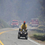 
              Area firefighters utilize an all terrain vehicle to help fight the Golden Fire in Camptonville, Calif. Friday, May 20, 202. (Elias Funez/The Union via AP)
            