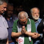 
              Kozo Okamoto, 74, a member of the Japanese Red Army guerrilla group, who served over 10 years in an Israeli prison for his part in the May 30, 1972 attack on Lod Airport in Israel that killed and wounded dozens of people, prays at a memorial for pro-Palestinian Japanese nationals, at a cemetery in Beirut, Lebanon, Monday, May 30, 2022. The Popular Front for the Liberation of Palestine, a radical Palestinian faction, commemorated in Beirut the 50th anniversary of the airport attack carried out by members the Japanese Red Army. (AP Photo/Hassan Ammar)
            