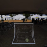 
              A soccer ball sits in a portable soccer goal at a camp for Ukrainian refugees in the Iztapalapa borough of Mexico City, Tuesday, May 24, 2022. Mexico City will close the camp that has hosted hundreds of Ukrainian refugees for the past month. Now that a U.S. program vetting refugees and then allowing them to fly to the U.S. is operational, authorities say the camp is no longer needed. (AP Photo/Marco Ugarte)
            