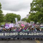 
              An abortion rights march extends down the streets during a demonstration from the National Mall to the Supreme Court of the United States in Washington, Saturday, May 14, 2022. Demonstrators are rallying from coast to coast in the face of an anticipated Supreme Court decision that could overturn women’s right to an abortion.   (AP Photo/Amanda Andrade-Rhoades)
            