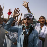 
              Supporters of ousted Pakistani Prime Minister Imran Khan chant slogans during in an anti-government rally, in Islamabad, Pakistan, Thursday, May 26, 2022. Defiant former Prime Minister Khan early Thursday warned Pakistan's government to set new elections in the next six days or he will again march on the capital along with 3 million people. (AP Photo/Anjum Naveed)
            