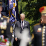 
              President Joe Biden arrives with Vice President Kamala Harris to lay a wreath at The Tomb of the Unknown Soldier at Arlington National Cemetery on Memorial Day, Monday, May 30, 2022, in Arlington, Va. (AP Photo/Andrew Harnik)
            