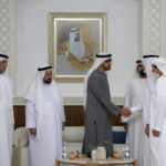
              This photo from Ministry of Presidential Affairs shows Sheikh Mohamed bin Zayed Al Nahyan, President of the United Arab Emirates and Ruler of the Emirate of Abu Dhabi, 4th left, shakes hands with one of the rulers in the presence of the Sheikh Mohammed bin Rashid Al Maktoum, Vice President, Prime Minister and Ruler of Dubai, 3rd right, Dr. Sheikh Sultan bin Muhammad Al Qasimi, Supreme Council Member and Ruler of Sharjah, 3rd left, and rest of UAE rulers, as Mohamed bin Zayed accepts their condolences, Saturday, May14, 2022. (Ministry of Presidential Affairs via AP/Hamad Al Kaabi)
            