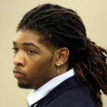 
              Former Virginia Tech football player Isimemen David Etute looks on during his trial in Montgomery County Circuit Court in Christiansburg, Va., Friday May 27 2022. Etute is accused of fatally beating Jerry Smith, 40 in May 2021, a man he met on an online dating site and had initially believed to be a woman. (Matt Gentry/The Roanoke Times via AP)
            