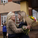 
              First lady Jill Biden hugs Olena Zelenskyy, spouse of Ukrainian's President Volodymyr Zelenskyy, outside of School 6, a public school that has taken in displaced students in Uzhhorod, Ukraine, Sunday, May 8, 2022. (AP Photo/Susan Walsh, Pool)
            