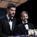 
              Director Lukas Dhont, left, and Eden Dambrine accept the grand prize for 'Close' during the awards ceremony of the 75th international film festival, Cannes, southern France, Saturday, May 28, 2022. (Photo by Joel C Ryan/Invision/AP)
            