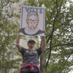 
              A protestor holds up a sign of former Supreme Court justice Ruth Bader Ginsburg during an abortion rights demonstration, Saturday, May 14, 2022, in New York. Demonstrators are rallying from coast to coast in the face of an anticipated Supreme Court decision that could overturn women's right to an abortion. (AP Photo/Jeenah Moon)
            