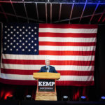 
              Former Vice President Mike Pence speaks on behalf of Georgia Gov. Brian Kemp during a rally, Monday, May 23, 2022, in Kennesaw, Ga. Pence is opposing former President Donald Trump and his preferred Republican candidate for Georgia governor, former U.S. Sen. David Perdue. (AP Photo/Brynn Anderson)
            