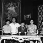 
              FILE - Philippines President Ferdinand Marcos and first lady Imelda sit with their children from left, Bongbong, Iren, and Immee, in November 1969, in Manila Philippines. Marcos Jr., son of the late dictator and his running mate Sara, who is the daughter of the outgoing President Rodrigo Duterte, are leading pre-election surveys despite his family's history. (AP Photo, File)
            