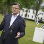 
              Dmytro Kuleba, Foreign Minister of Ukraine, addresses the media during a statement in front of Weissenhaus Castle during the G7 Group of leading democratic economic powers at the Weissenhaus resort in Weissenhaeuser Strand, Germany, Friday, May 13, 2022. In addition to the United States and Germany, the G7 also includes Great Britain, France, Italy, Canada and Japan. The main topic of the meeting is the war in Ukraine. (Marcus Brandt/DPA via AP, Pool)
            