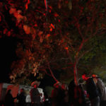 Revelers take part in the grand dance of the night of the religious tradition, "Folia do Divino Espirito Santo" or Feast of the Divine, in the rural area of Pirenopolis, state of Goias, Brazil, Saturday, May 28, 2022. Celebrated in the period of Pentecost, Christian residents celebrate on what they believe is the coming of the Holy Spirit on the apostles of Jesus Christ. (AP Photo/Eraldo Peres)