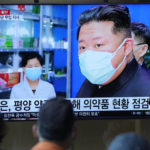 
              FILE - People watch a TV screen showing a news program reporting with an image of North Korean leader Kim Jong Un, at a train station in Seoul, South Korea on May 16, 2022. As an illness suspected to be COVID-19 sickens hundreds of thousands of his people, Kim stands at a critical crossroad. Does he swallow his pride and accept help or does he go it alone even though a huge number of fatalities could undermine his leadership? (AP Photo/Lee Jin-man, File)
            