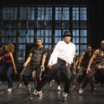 
              This image released by O & M Co./DKC shows Myles Frost, center, and the cast during a performance of the musical "MJ." (Matthew Murphy/O & M Co./DKC via AP)
            