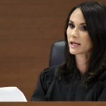 
              Judge Elizabeth Scherer reads instructions to potential jurors during jury selection in the penalty phase of the trial of Marjory Stoneman Douglas High School shooter Nikolas Cruz at the Broward County Courthouse in Fort Lauderdale on Monday, May 16, 2022. Cruz previously plead guilty to all 17 counts of premeditated murder and 17 counts of attempted murder in the 2018 shootings. (Amy Beth Bennett/South Florida Sun Sentinel via AP, Pool)
            