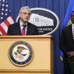 
              Attorney General Merrick Garland speaks at a news conference to announce actions to enhance the Biden administration's environmental justice efforts, Thursday, May 5, 2022, at the Department of Justice in Washington. Standing with Garland are Associate Attorney General Vanita Gupta, back left, and Environmental Protection Agency administrator Michael Regan. (AP Photo/Patrick Semansky)
            