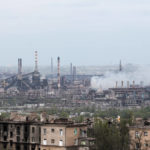
              Smoke rises from the Metallurgical Combine Azovstal in Mariupol, in territory under the government of the Donetsk People's Republic, eastern in Mariupol, Ukraine, Thursday, May 5, 2022. Heavy fighting is raging at the besieged steel plant in Mariupol as Russian forces attempt to finish off the city's last-ditch defenders and complete the capture of the strategically vital port. (AP Photo)
            