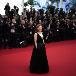 
              FILE - Julianne Moore poses for photographers upon arrival at the opening ceremony and the premiere of the film 'Final Cut' at the 75th international film festival, Cannes, southern France, Tuesday, May 17, 2021. Star power has been out in force at the 75th Cannes Film Festival. After a 2021 edition muted by the pandemic, this year's French Riviera spectacular has again seen throngs of onlookers screaming out "Tom!" "Julia!" and "Viola!" The wattage on display on Cannes' red carpet has been brighter this year thanks the presence of stars like Tom Cruise, Julia Roberts, Viola Davis, Anne Hathaway, Idris Elba and others. But as the first half of the French Riviera spectacular has shown, stardom in Cannes is global. Just as much as cameras have focused on Hollywood stars, they've been trained on the likes of India's Aishwarya Rai and South Korea's Lee Jung-jae. (AP Photo/Daniel Cole, File)
            