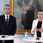 
              NATO Secretary General Jens Stoltenberg, left, and Danish Prime Minister Mette Frederiksen meet at Kastellet in Copenhagen, Denmark, Thursday May 19, 2022. (Martin Sylvest/Ritzau Scanpix via AP)
            