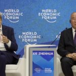 
              John F. Kerry, Special Presidential Envoy for Climate of the United States, left, gestures besides Xie Zhenhua, Special Envoy for Climate Change of the People's Republic of China, during the World Economic Forum in Davos, Switzerland, Tuesday, May 24, 2022. The annual meeting of the World Economic Forum is taking place in Davos from May 22 until May 26, 2022. (AP Photo/Markus Schreiber)
            