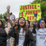 
              Supporters of actor Johnny Depp rally outside of Fairfax County Courthouse as a jury is scheduled to hear closing arguments in Johnny Depp's high-profile libel lawsuit against ex-wife Amber Heard in Fairfax, Va., on Friday, May 27, 2022.(AP Photo/Craig Hudson)
            