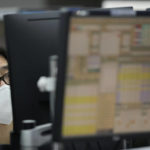 
              A currency trader watches monitors at the foreign exchange dealing room of the KEB Hana Bank headquarters in Seoul, South Korea, Thursday, May 12, 2022. Shares fell in Asia on Thursday after the release of worse U.S. inflation data than expected sparked heavy selling of technology stocks on Wall Street. (AP Photo/Ahn Young-joon)
            