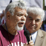 
              Tejano singer Little Joe, left, with Little Joe y la Familia, speaks next to Houston civil rights activist Johnny Mata, right, during a press conference by the League of United Latin American Citizens outside of the National Rifle Association's annual meeting held at the George R. Brown Convention Center, Friday, May 27, 2022, in Houston. (AP Photo/Michael Wyke)
            