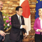 
              European Commission President Ursula von der Leyen, right, and European Council President Charles Michel, left, meet Japanese Prime Minister Fumio Kishida prior to their talks at the prime minister's official residence in Tokyo Thursday, May 12, 2022. (Yoshikazu Tsuno/Pool Photo via AP)
            