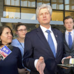 
              FILE - Rep. Jeff Fortenberry, R-Neb., center, speaks with the media outside the federal courthouse in Los Angeles, March 24, 2022. Fortenberry was convicted of charges that he lied to federal authorities about an illegal $30,000 contribution to his campaign from a foreign billionaire at a 2016 Los Angeles fundraiser. (AP Photo/Brian Melley, File)
            