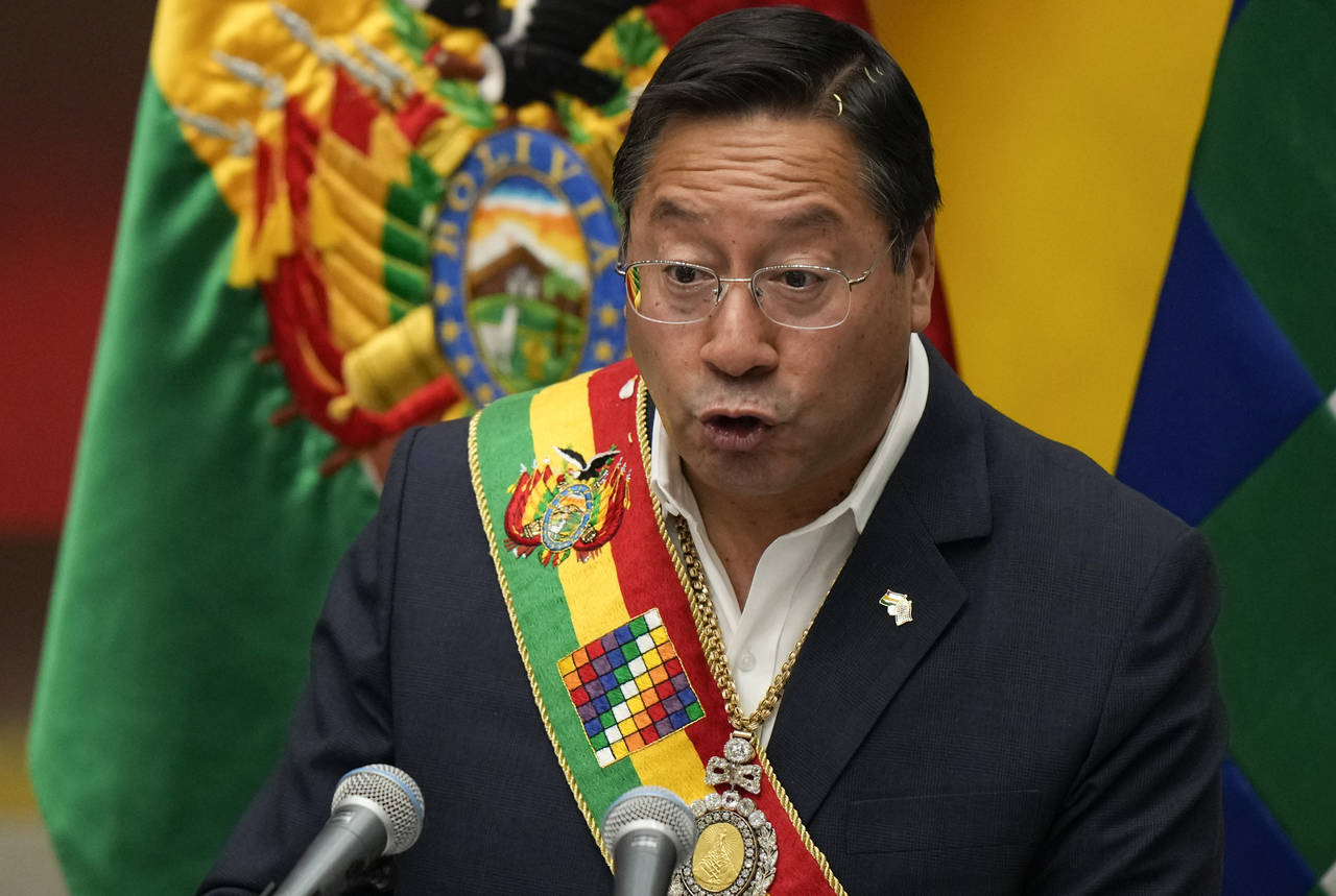 FILE - Bolivia's President Luis Arce addresses the nation at the presidential palace in La Paz, Bol...