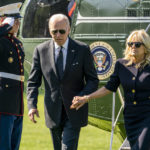 
              President Joe Biden and first lady Jill Biden arrive on the South Lawn of the White House in Washington, Monday, May 30, 2022, after returning from Wilmington, Del. (AP Photo/Andrew Harnik)
            
