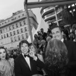 
              Tom Cruise, second left, gestures upon arrival at the premiere of the film 'Top Gun: Maverick' at the 75th international film festival, Cannes, southern France, Wednesday, May 18, 2022. (AP Photo/Petros Giannakouris)
            